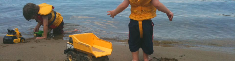 Playing on the beach – slider